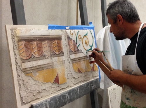 Finishing second layer of intonaco (with Roman plaster) for multi-layer didactic fresco panel, by ilia Fresco 